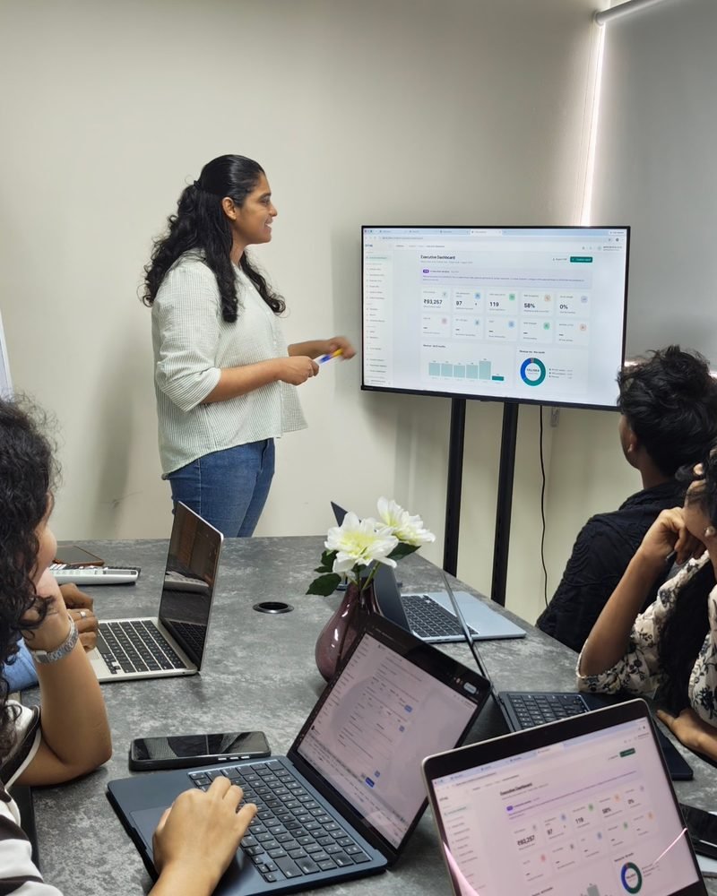 A discovery workshop: walking the team through the modules on the meeting-room screen