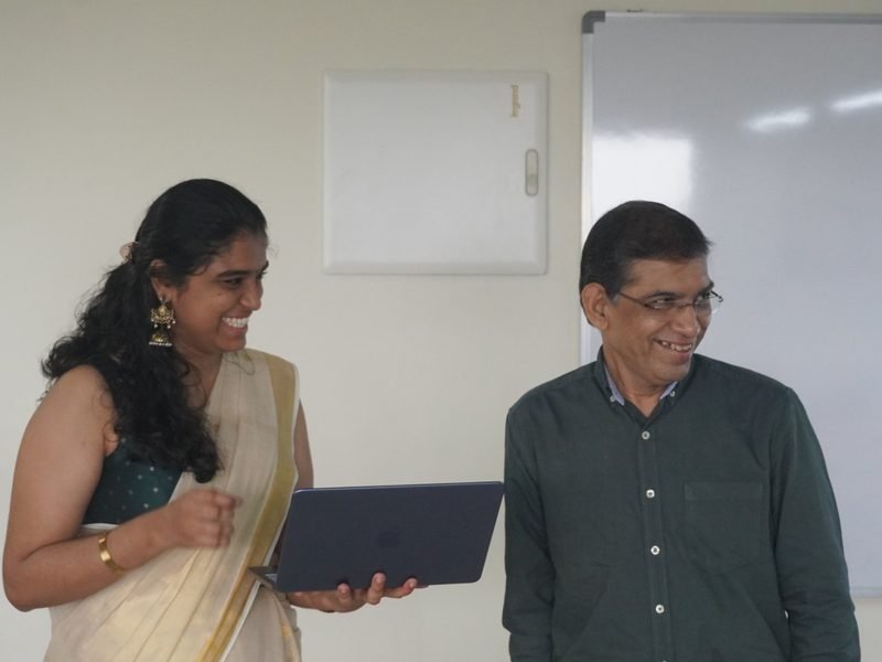 A senior architect and an engineer sharing a laugh over a build at the Kochi office